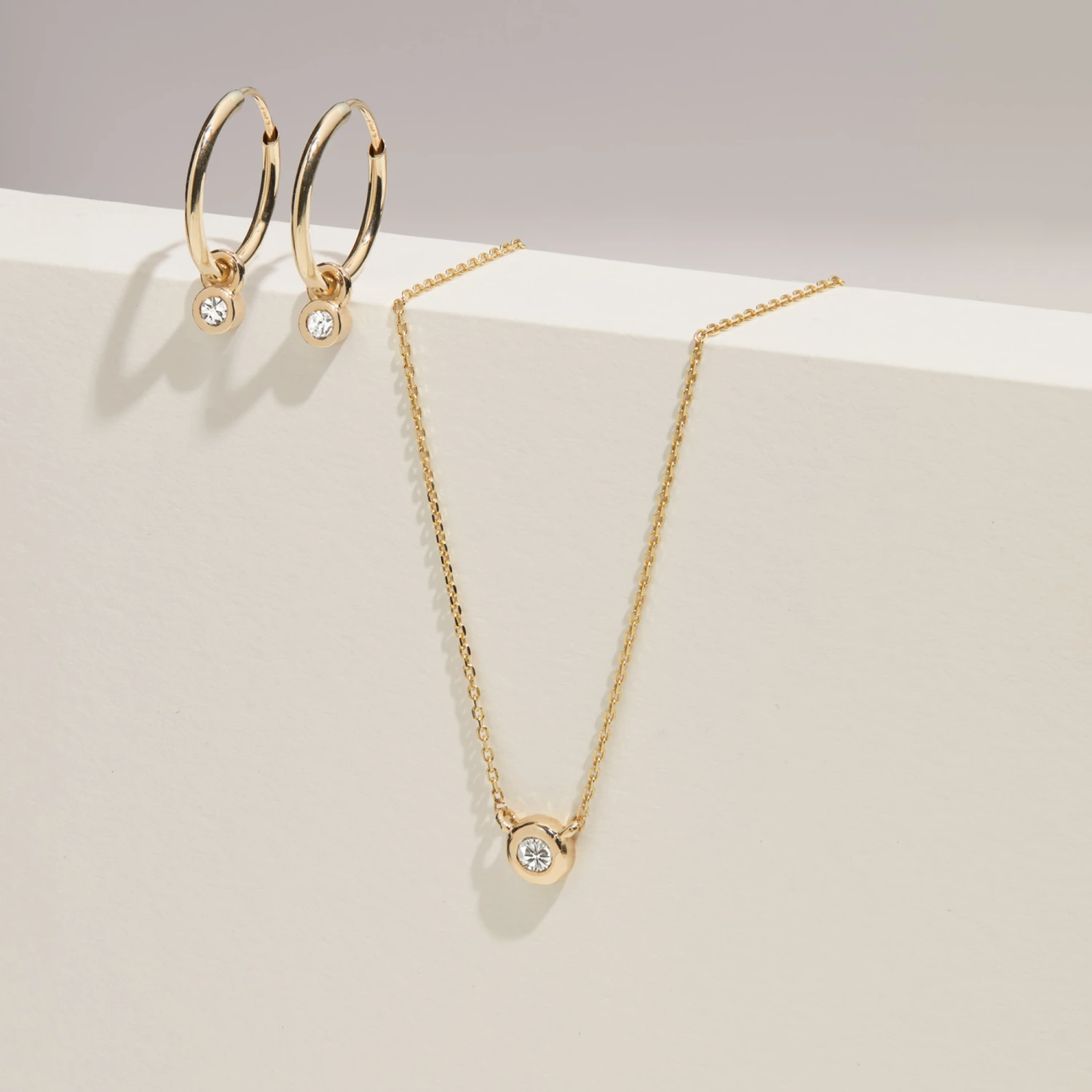 Solid White Gold Mini Floating Diamond Hoop Earrings - Image 5