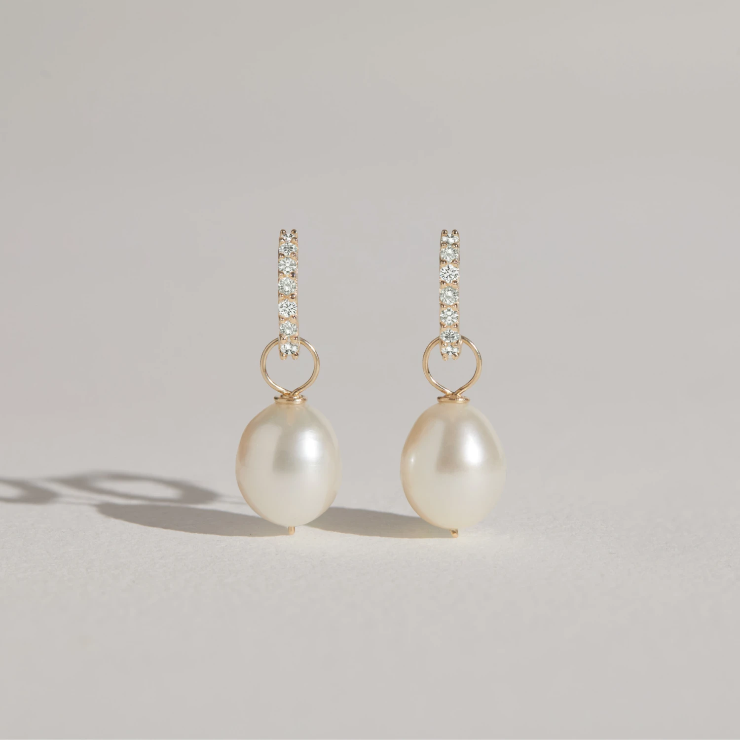 Gold Huggie Pearl Drop Earrings - Image 8